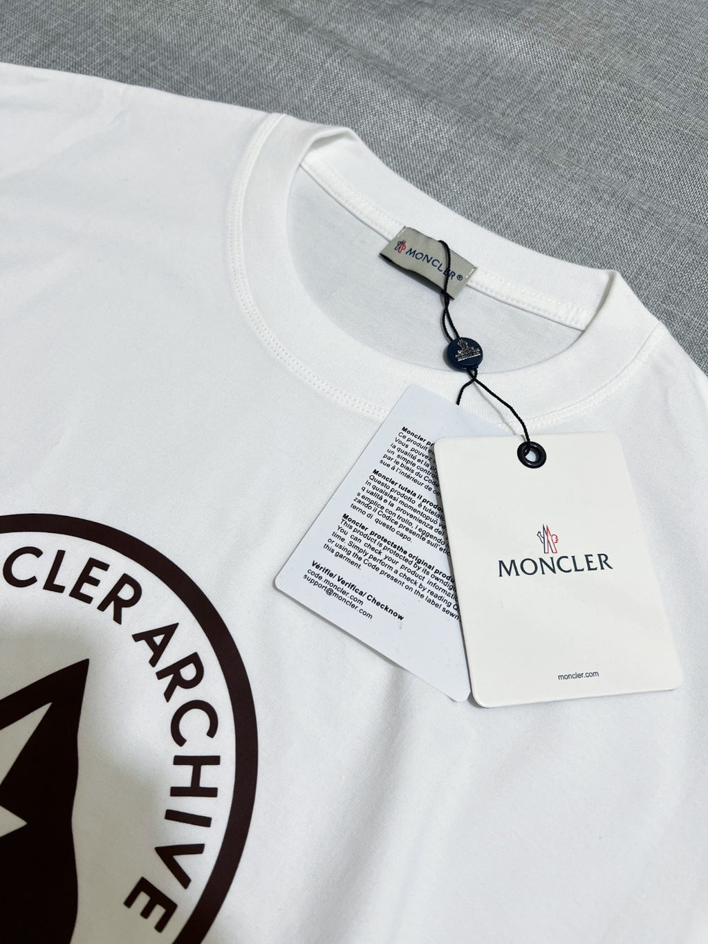 White T-shirt neck tag with Moncler branding