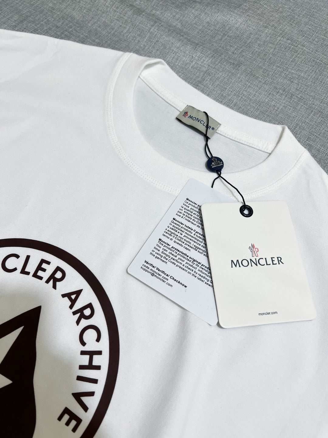 White T-shirt neck tag with Moncler branding