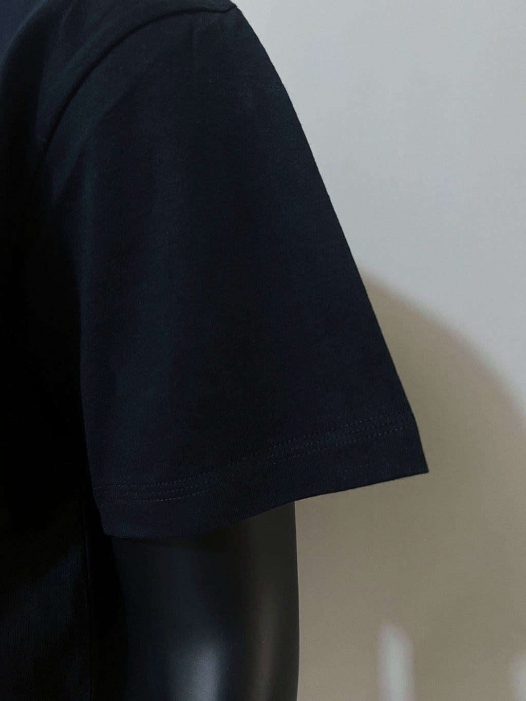 Dark navy short-sleeve T-shirt sleeve on mannequin