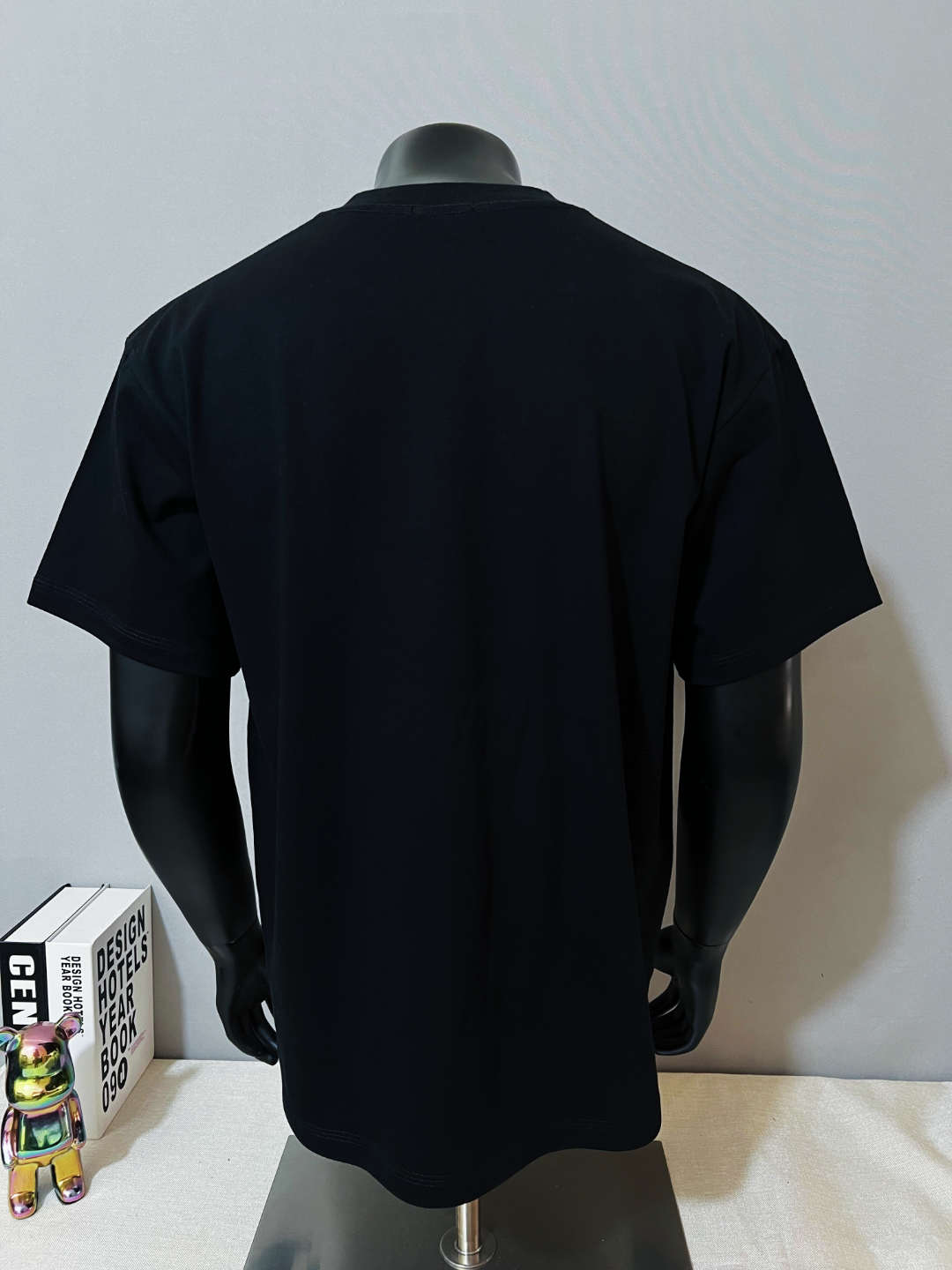 Dark navy short-sleeve T-shirt plain back on mannequin