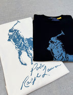 Polo Ralph Lauren folded black T-shirt with blue polo player graphic on top