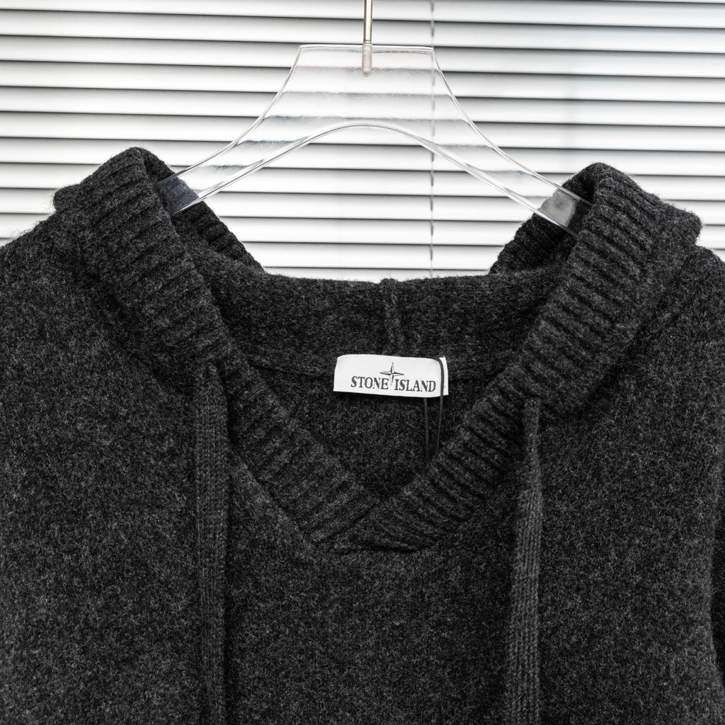 Stone Island hooded sweater neckline detail with small brand patch on chest