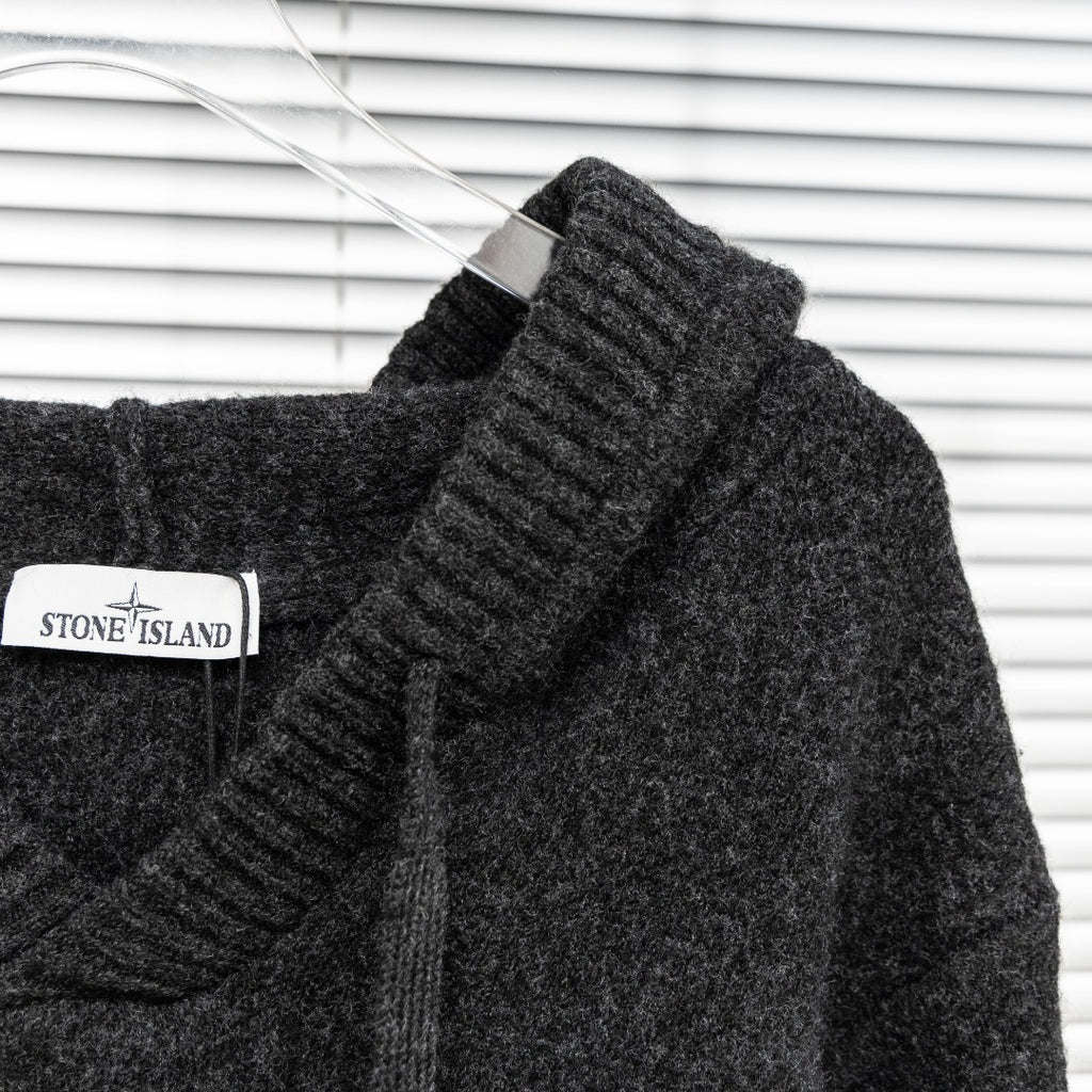 Stone Island hooded sweater shoulder and hood edge detail in dark charcoal knit