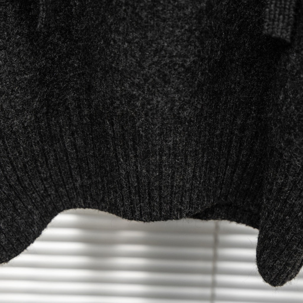 Stone Island hooded sweater ribbed cuff and knit texture close-up in dark charcoal