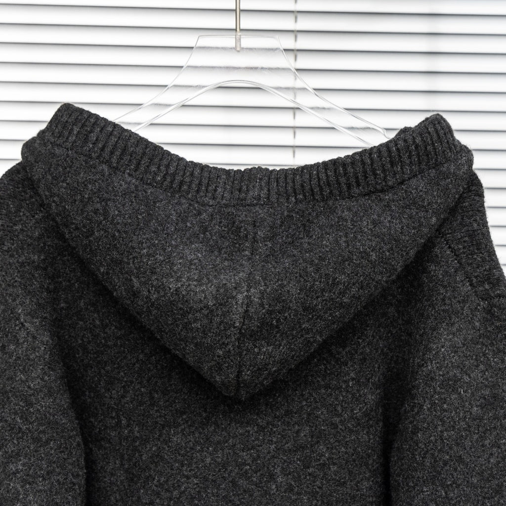 Dark charcoal knit hoodie with hood and ribbed neckline