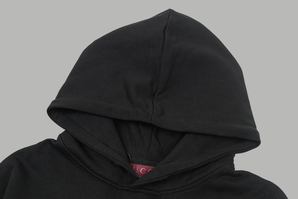 Black hoodie hood close-up with drawstring