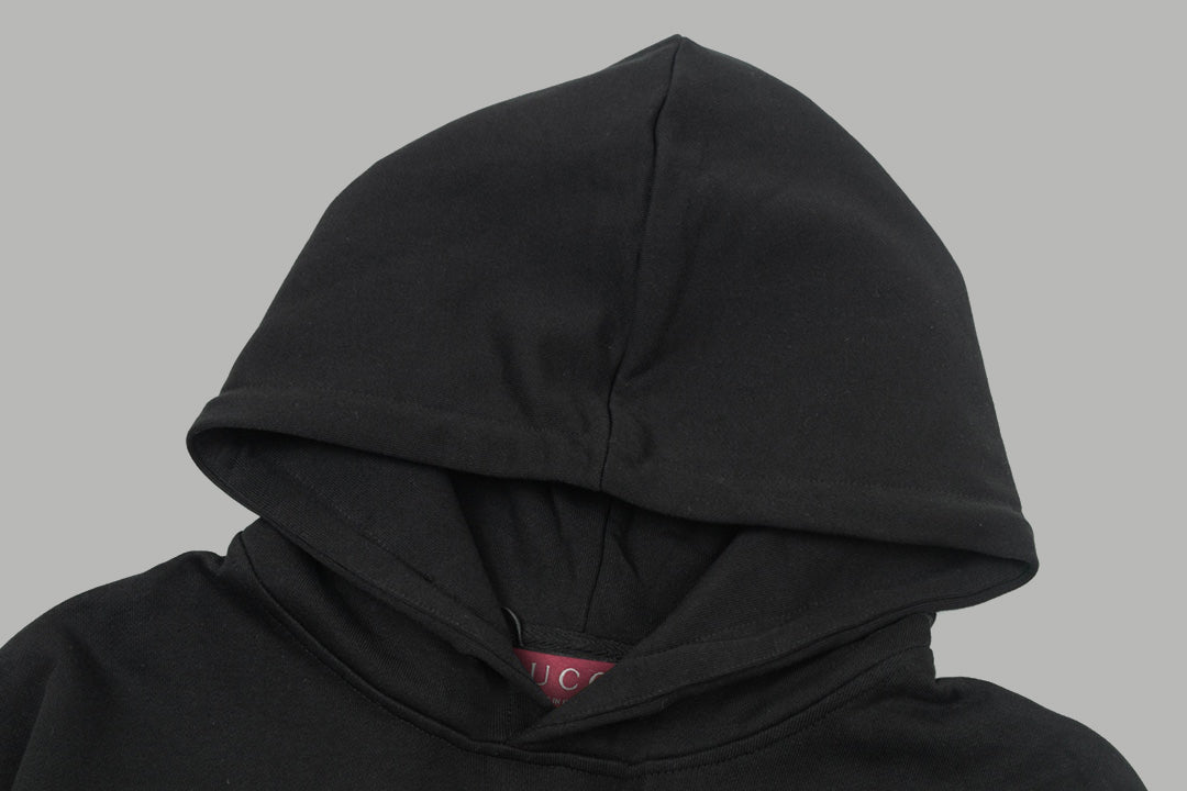 Black hoodie hood close-up with drawstring