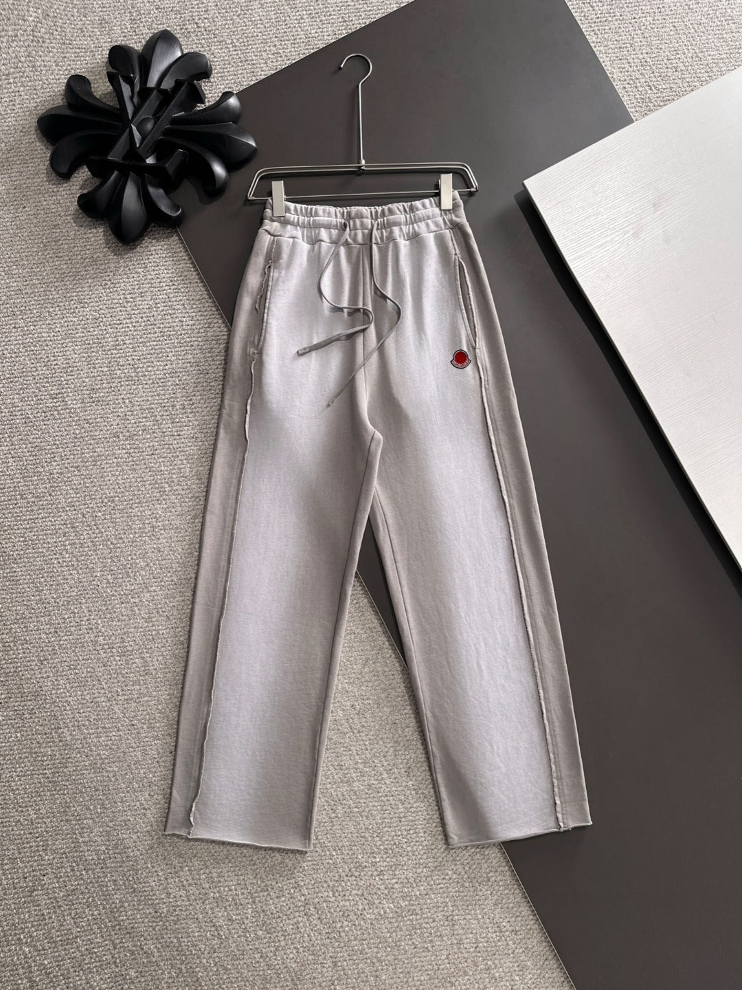 Light gray drawstring pants, elastic waist, Moncler logo patch