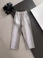 Light gray drawstring pants with elastic waist and front pockets