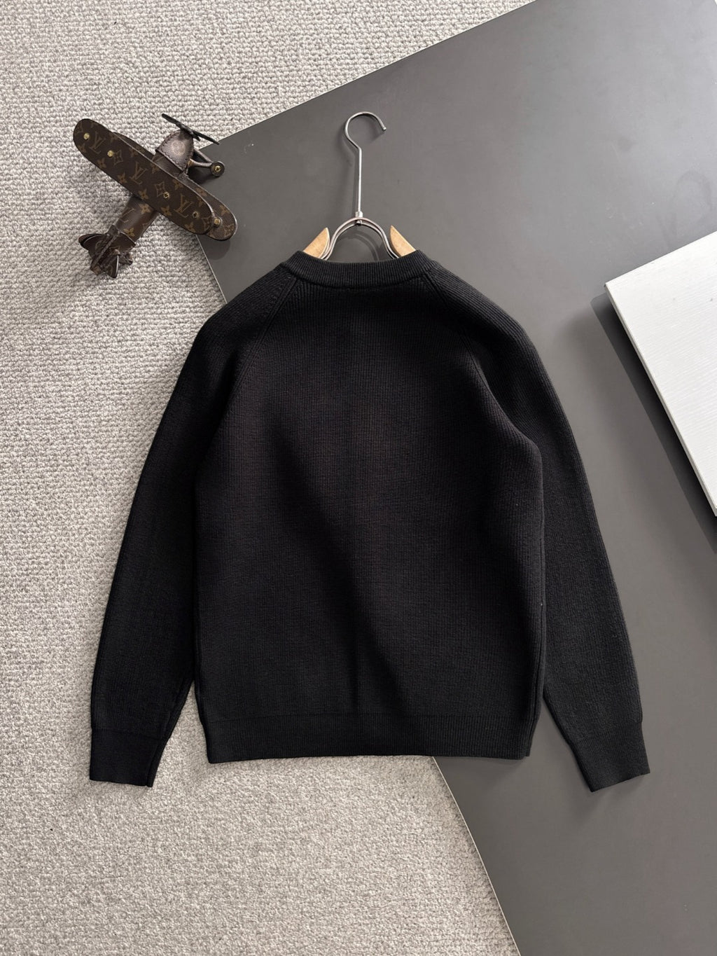 Black cardigan jacket with stand collar and button front