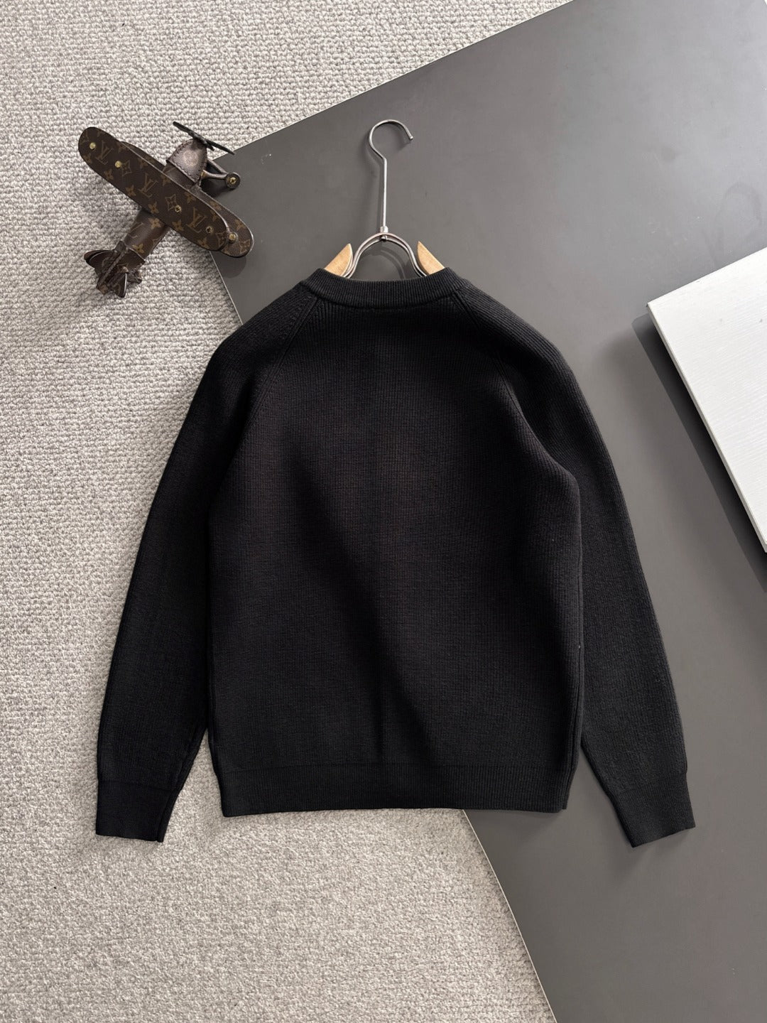 Black cardigan jacket with stand collar and button front