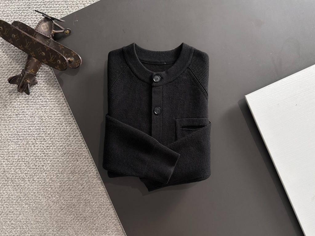 Black cardigan top with long sleeves and front buttons