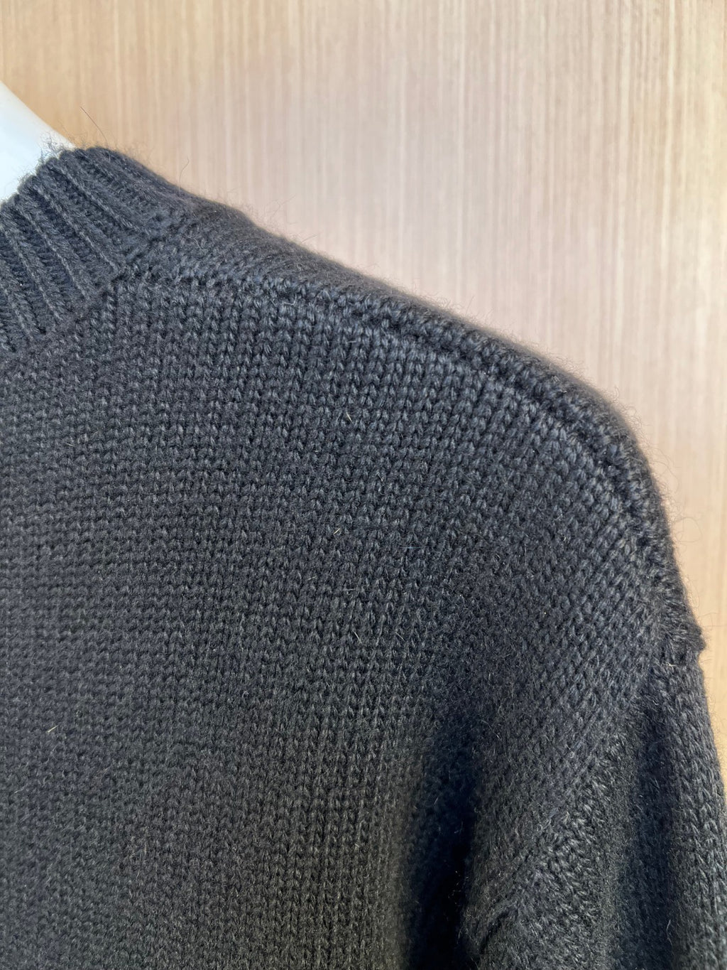 Charcoal knit sweater back with textured knit and ribbed shoulder