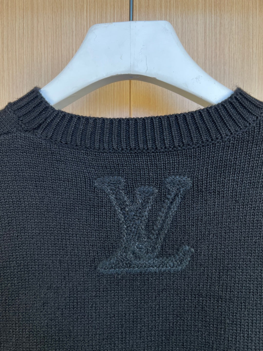 Dark knit sweater chest with large LV monogram