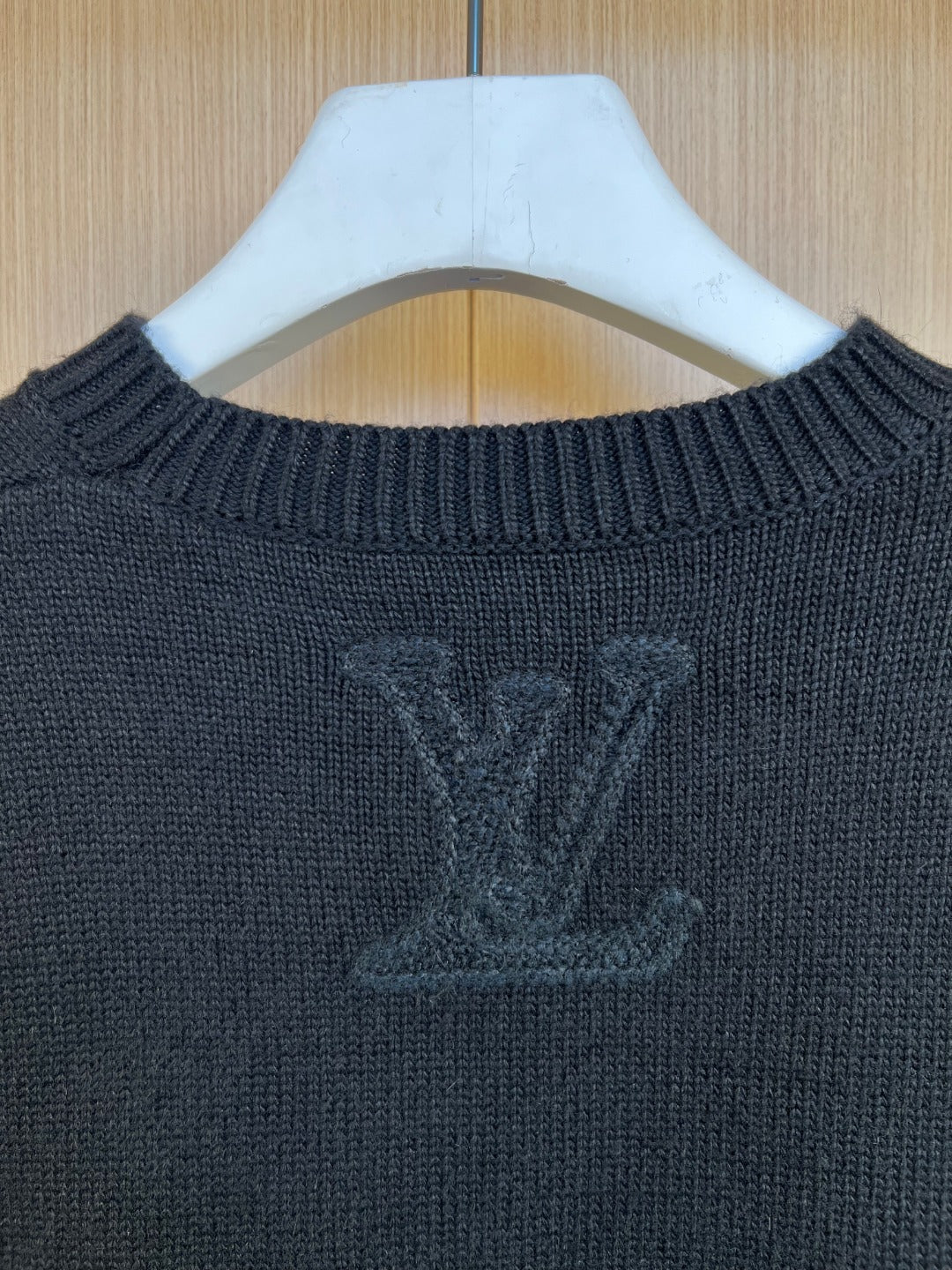 Dark knit sweater chest with large LV monogram