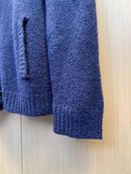 Navy knit cardigan sleeve with ribbed cuff and textured knit