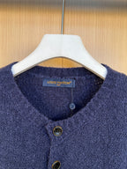 Louis Vuitton navy knit cardigan neckline with button placket and gold-tone buttons