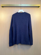 Navy knit cardigan back with long sleeves and ribbed hem