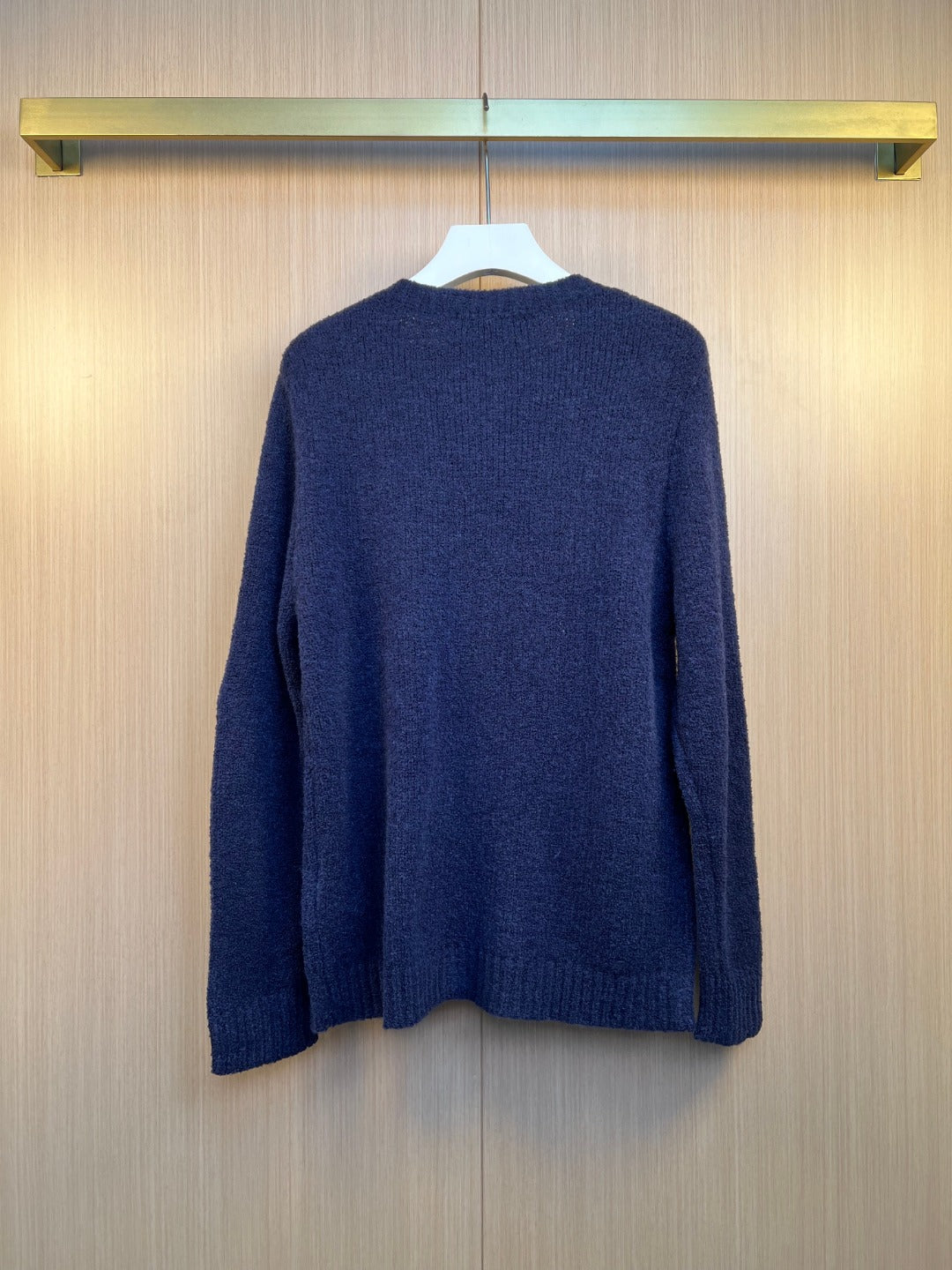 Navy knit cardigan back with long sleeves and ribbed hem