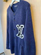Navy Louis Vuitton knit cardigan front with button placket and white LV-style logo