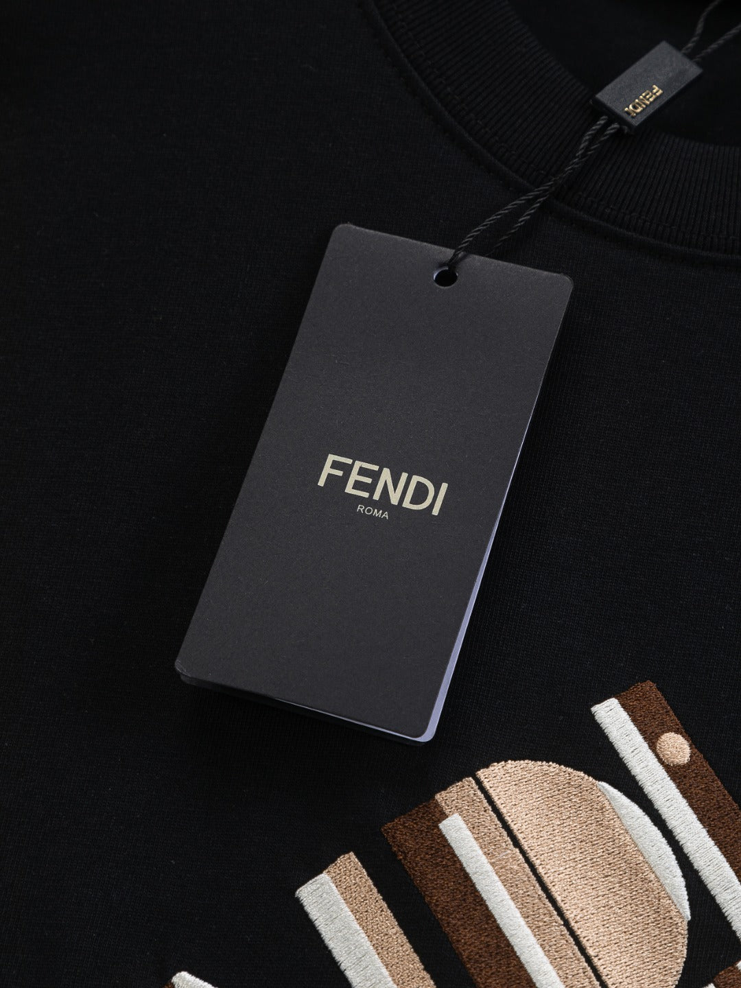 Black Fendi shorts with brand logo tag