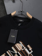 Black Fendi short-sleeve T-shirt on hanger with FENDI logo print