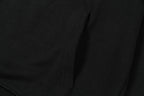 Black hoodie fabric and seam detail