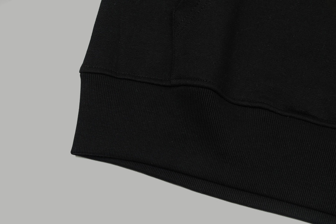 Black hoodie ribbed hem and sleeve cuff detail