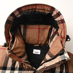 Plaid hood lining with black inner panel inside long quilted jacket