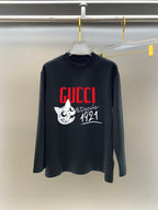 Dark long-sleeve crewneck T-shirt with red GUCCI logo and white cat graphic