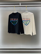 Prada graphic long-sleeve top, dark navy, crew neck, colorful triangular print