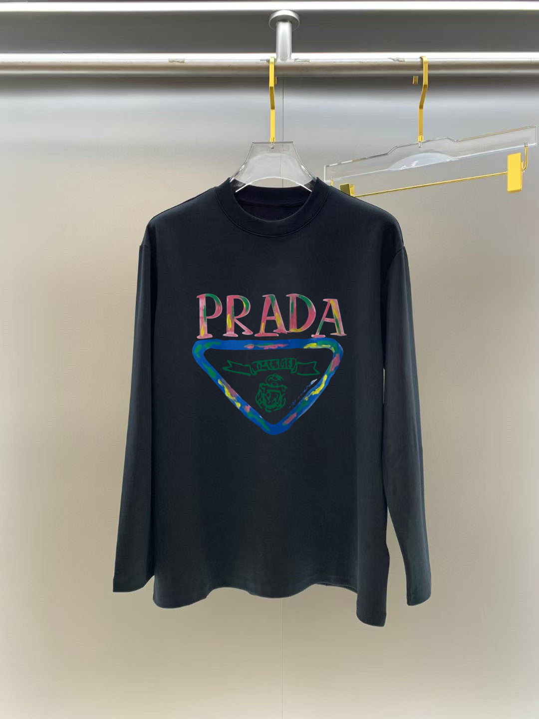 Prada graphic long-sleeve top, dark navy, crew neck, front PRADA triangle logo