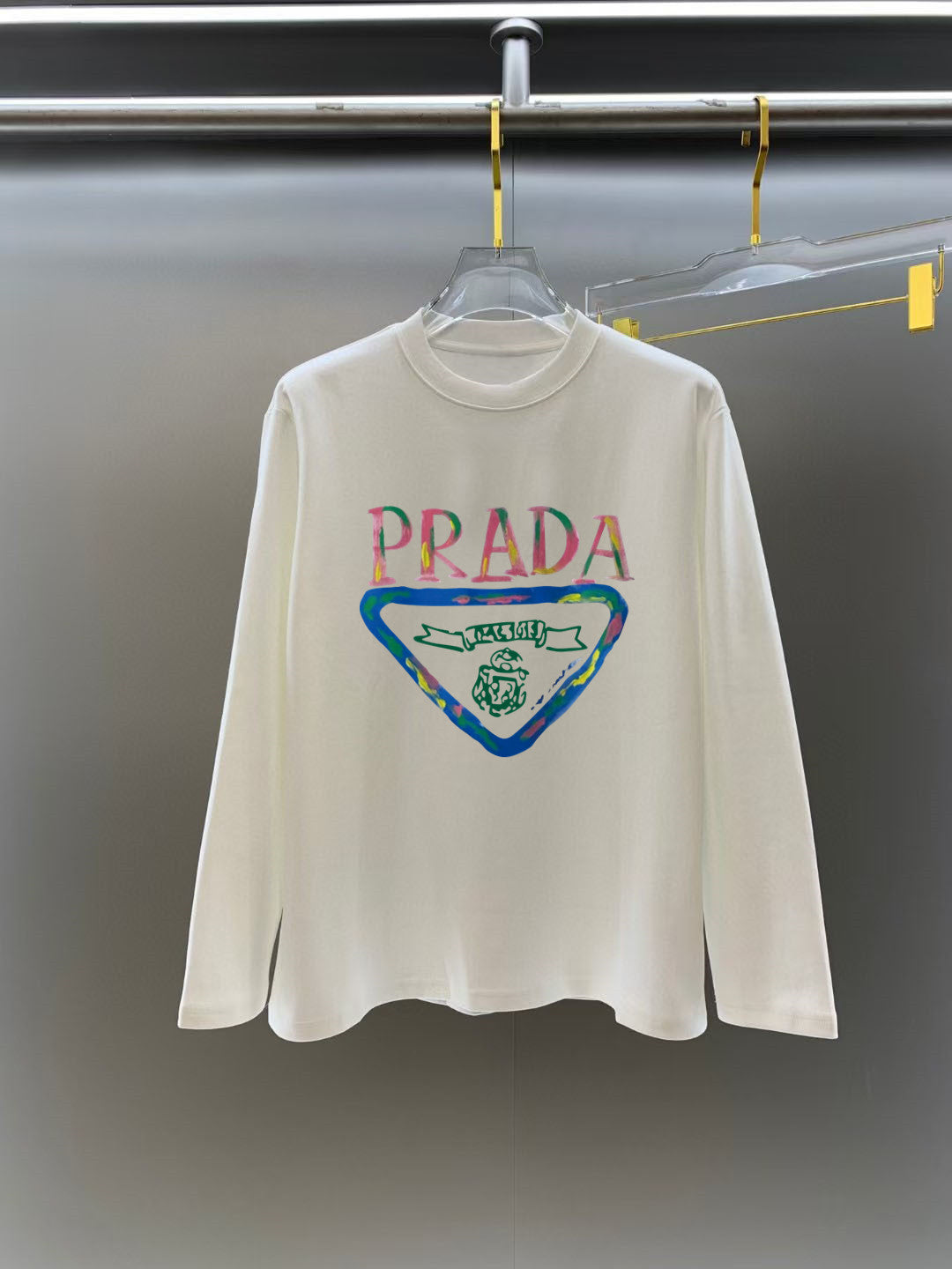 Prada graphic long-sleeve top, white, crew neck, colorful triangular print