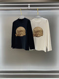 Louis Vuitton long-sleeve shirts, black and white, with large front logo print