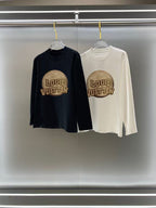 Louis Vuitton long-sleeve shirts, black and white, with large front logo print