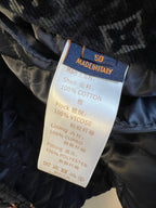 Clothing care label: Made in Italy, 100% cotton shell, viscose lining, polyester fill