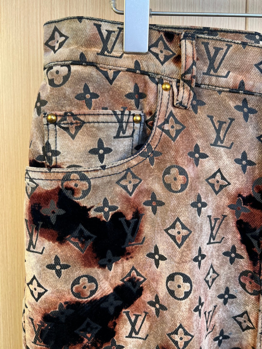 Louis Vuitton printed pants front with button waistband, belt loops, patch pockets