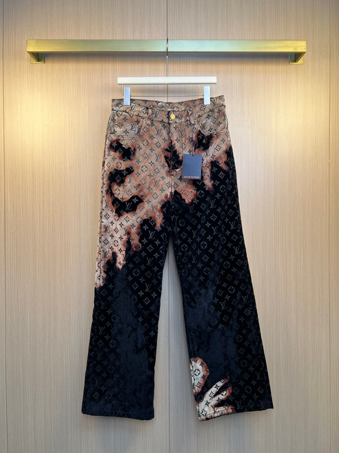 Louis Vuitton monogram pants with wide legs, dark and tan printed fabric