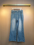 Blue monogram wide-leg pants with elastic waistband and belt loops