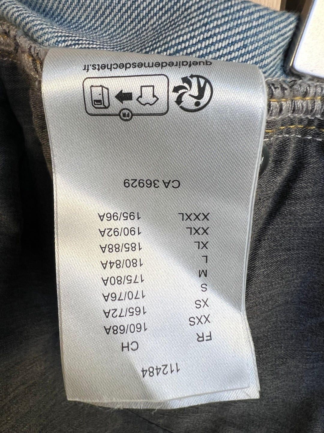 Blue monogram pants size label tag with size markings