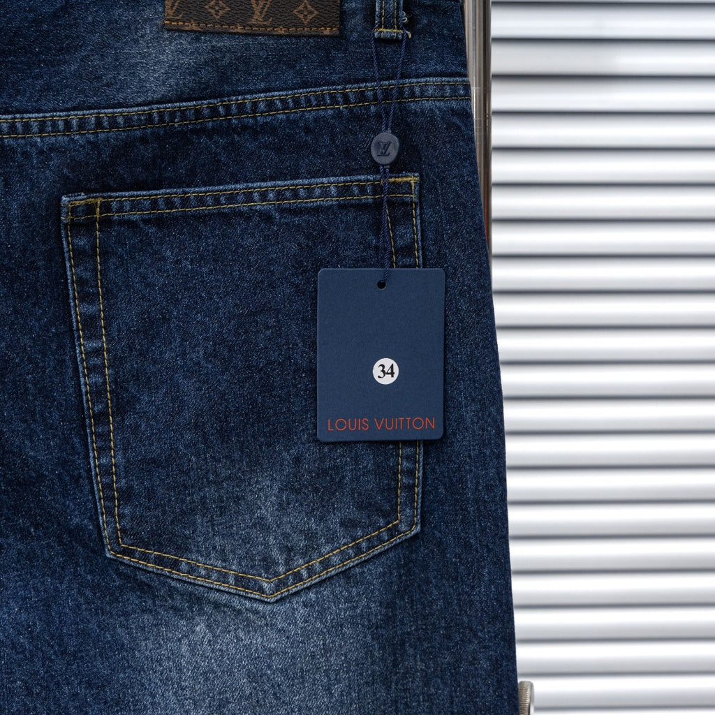 Dark blue denim jeans pocket with Louis Vuitton size tag and stitched edges