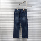 Dark blue denim jeans with front patch pocket and Louis Vuitton logo