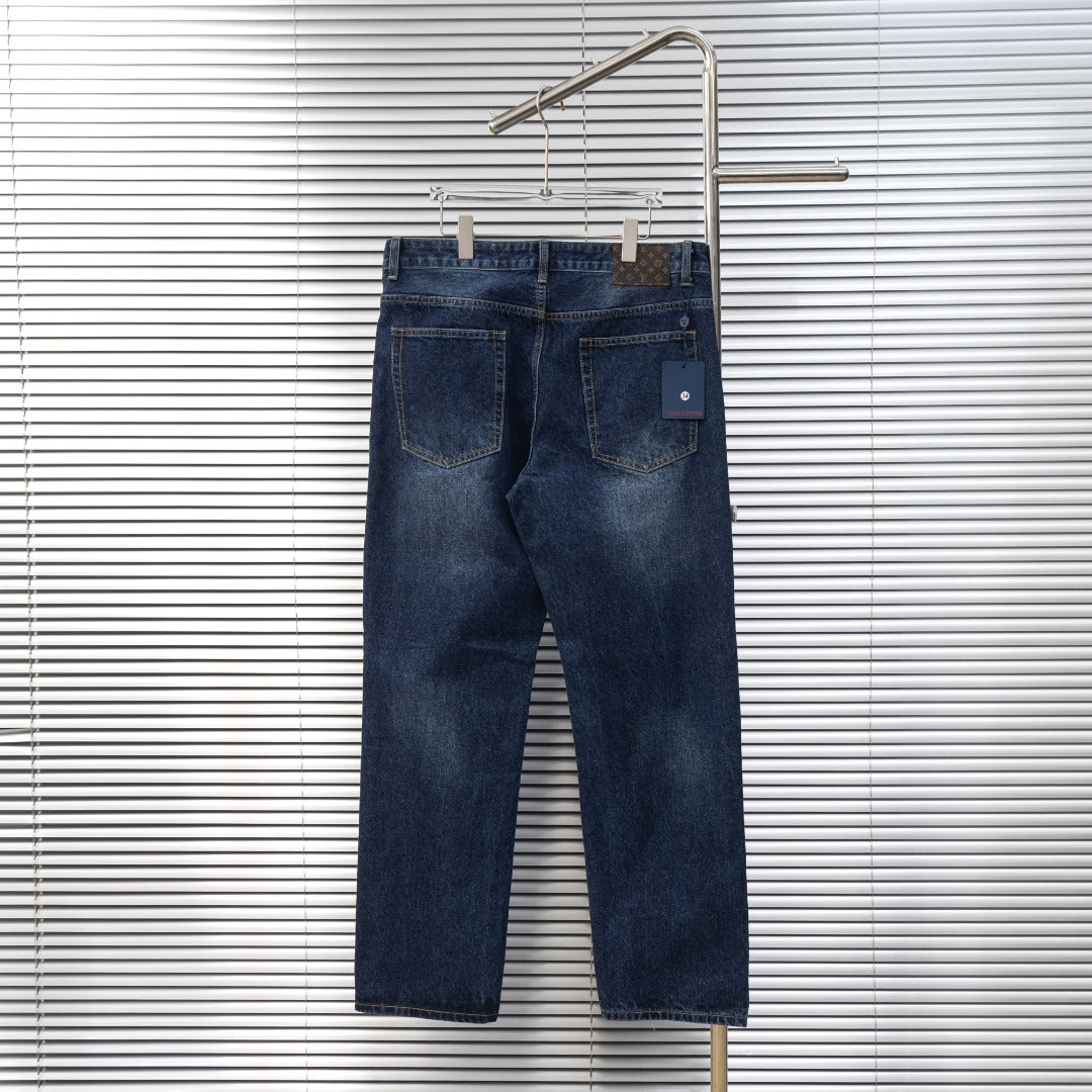Dark blue denim jeans with front patch pocket and Louis Vuitton logo