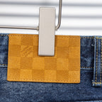 Louis Vuitton pants, blue denim with yellow fabric patch detail