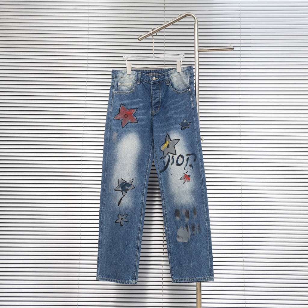 Dior denim pants with colorful star patches and distressed light-wash finish