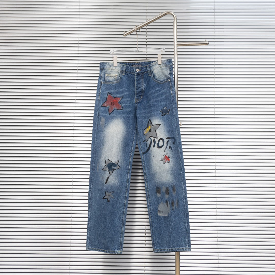 Dior denim pants with colorful star patches and distressed light-wash finish