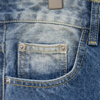 Dior denim pants coin pocket detail with light-wash panels and yellow stitching
