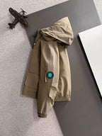 Lightweight hooded jacket in tan, logo patch on sleeve and front zip