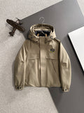 Fendi long parka in light tan with hood, zip front, and snap pockets