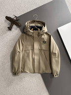 Fendi long parka in light tan with hood, zip front, and snap pockets